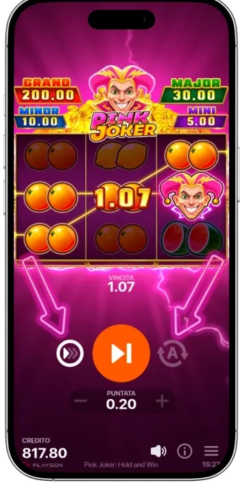 Pink Joker spin in progress on a phone, with arrows marking the speed toggle on the left and the Autoplay button on the right